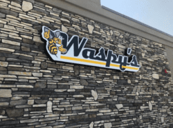 logo of the best iowa truck stop, waspy's